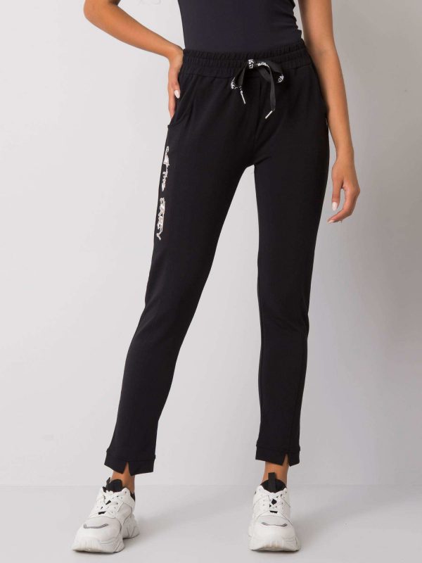 Black sweatpants with Peyton inscriptions