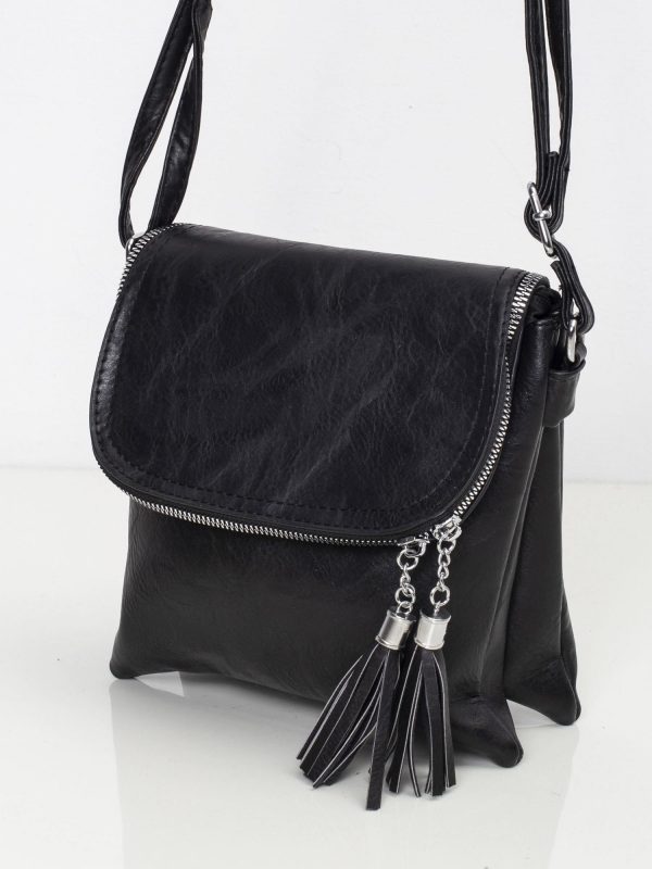 Black handbag with tasses