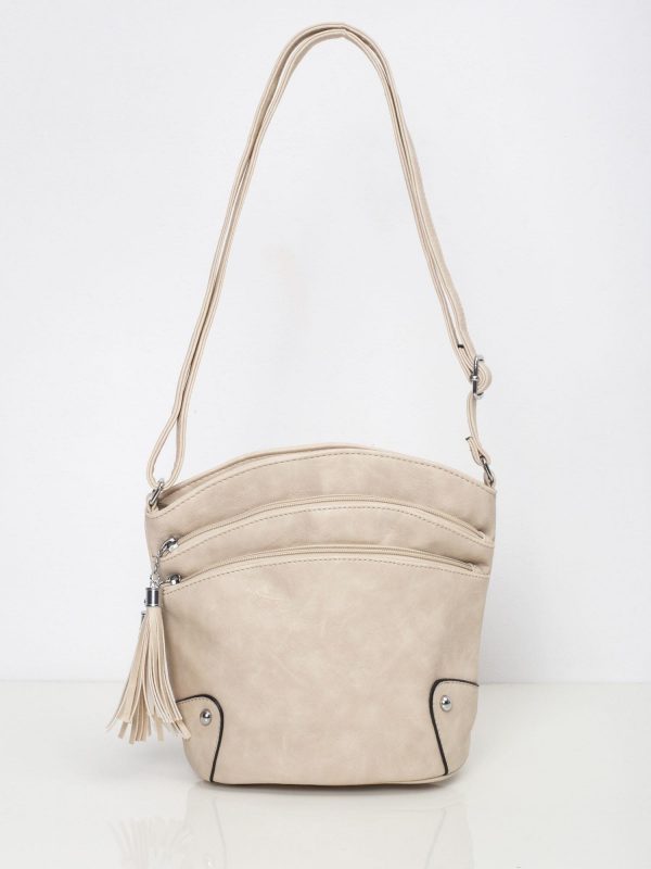 Beige handbag with zippers