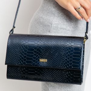 Navy blue lacquered clutch bag with snake skin motif