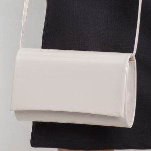 Light beige clutch bag made of patent leather