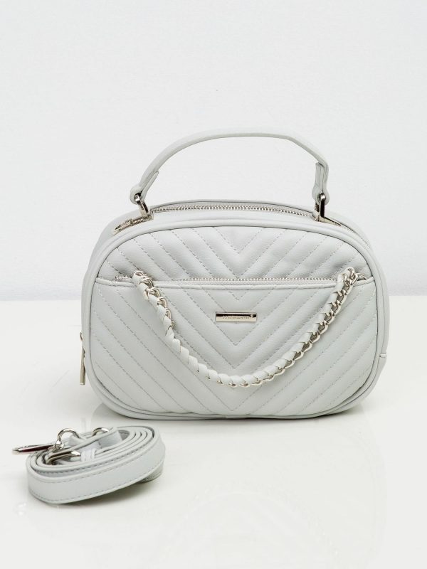 Light grey handbag with decorative chain