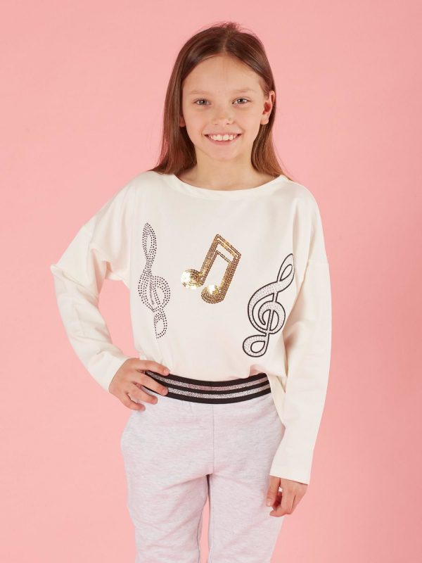 Ecru girl blouse with musical applique