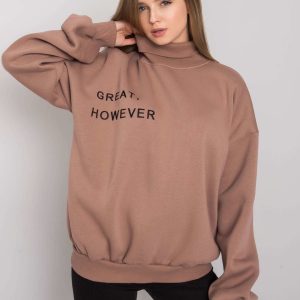 Kelly's light brown oversized sweatshirt