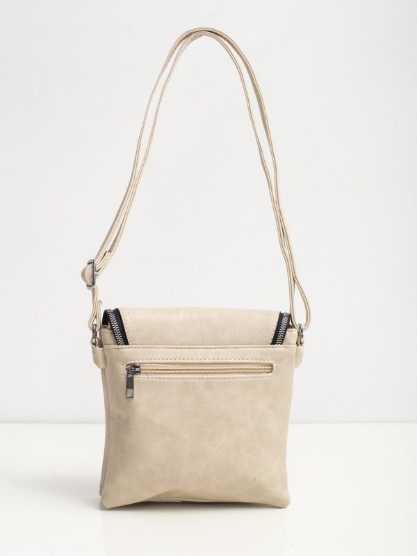 Beige handbag with tasses