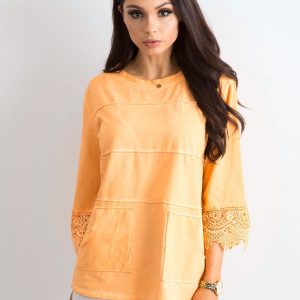 Orange blouse with lace and pockets