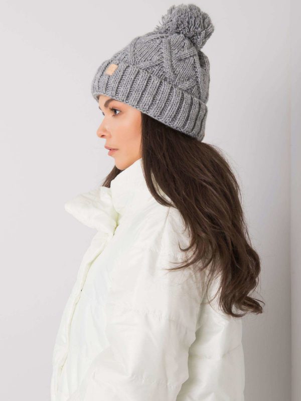 Gray winter hat with pompom