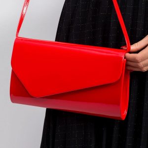 Red lacquered clutch bag