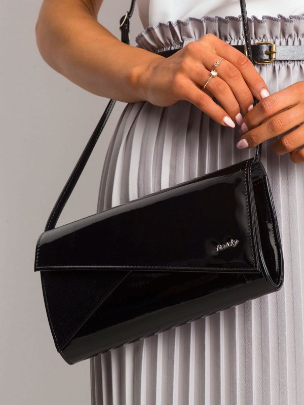 Black clutch bag with asymmetrical flap