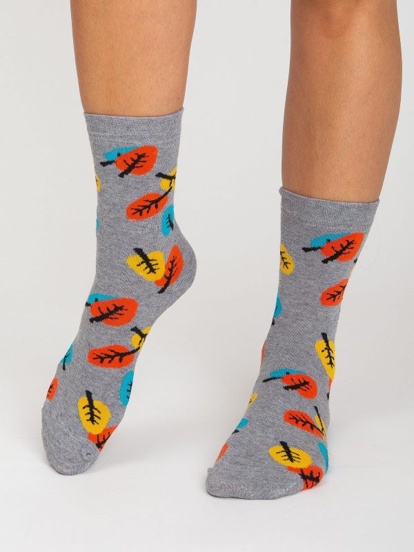 Grey women's socks in leaves