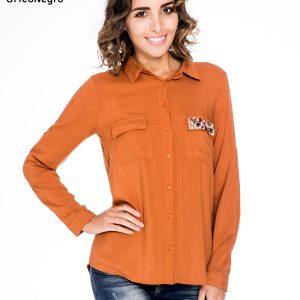 Orange blouse with jewellery pocket