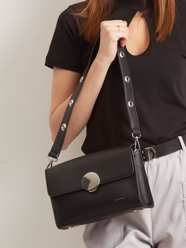 Black handbag with decorative clasp