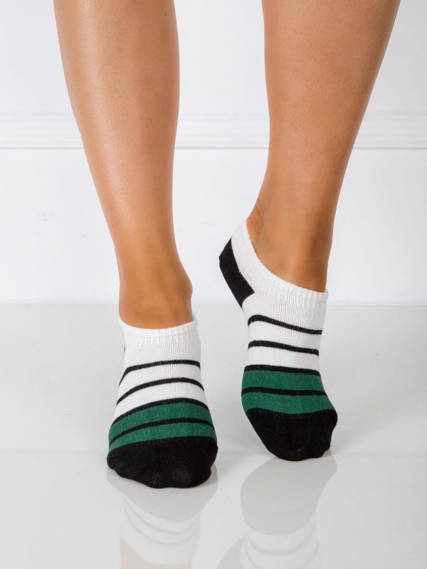 White and green women's feet