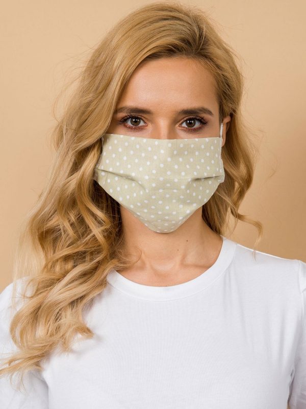 Beige protective mask with peas