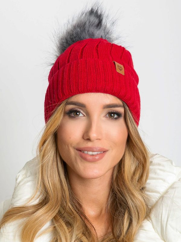 Red winter hat with pompom