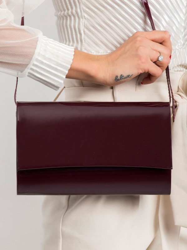 Plum lacquered clutch