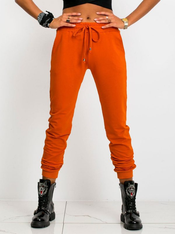 Dark orange pants Faster