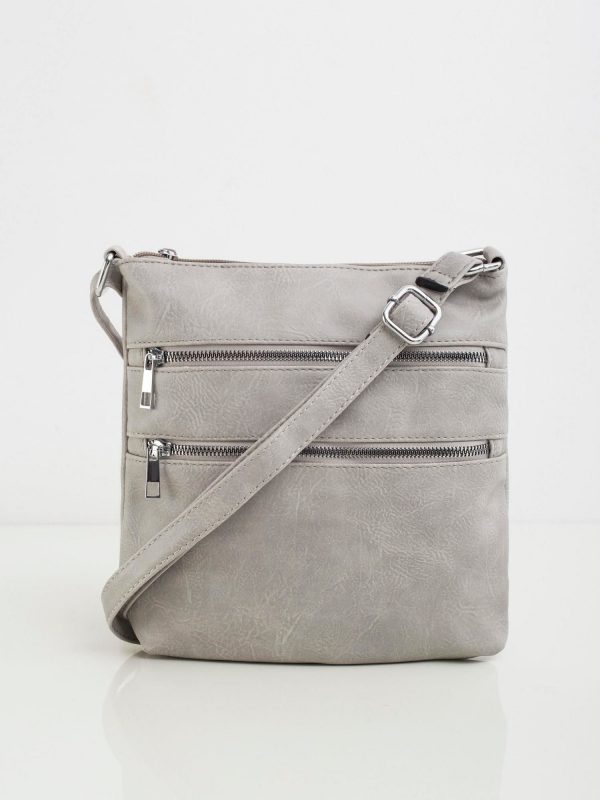 Grey handbag with zippers