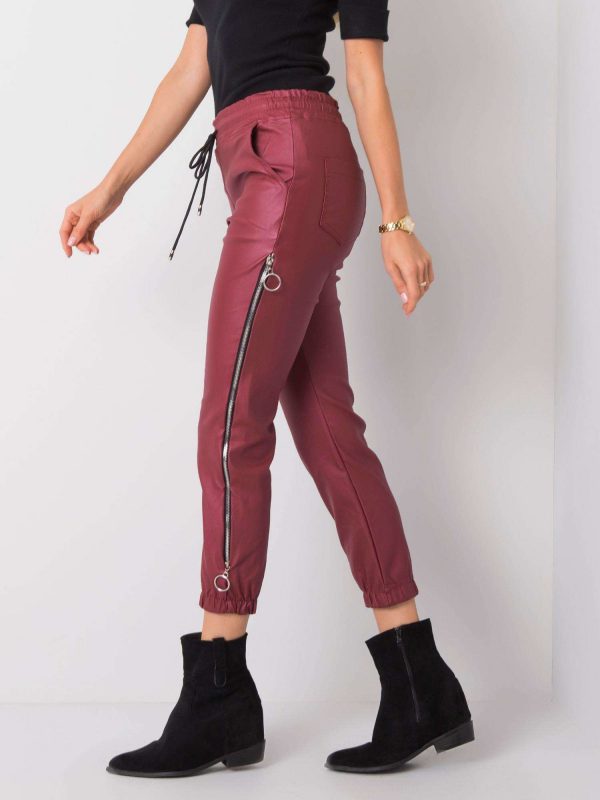 Jackie's maroon waxed pants