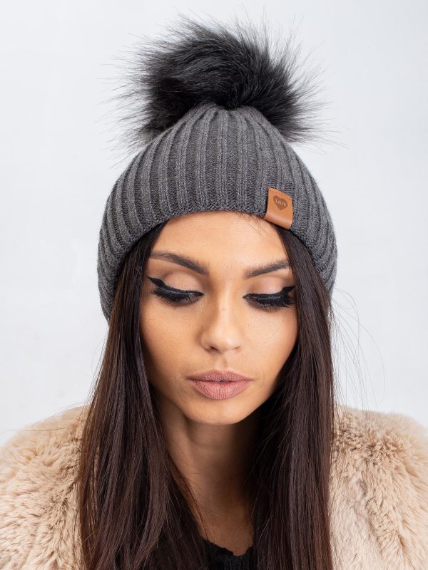 Dark gray winter hat with tassel