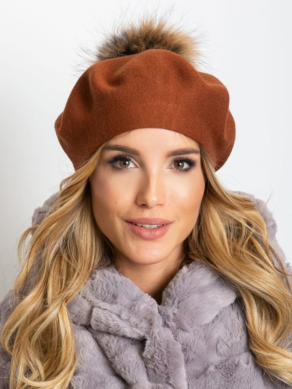 Brown knitted beret with tassel