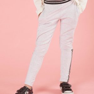 Light grey children's sweatpants with appliqués