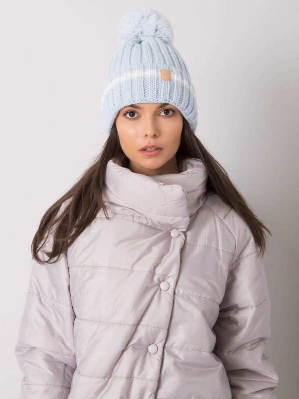 Light blue hat with pompom