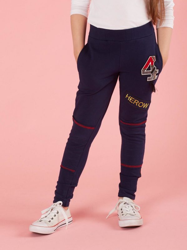 Navy blue children's sweatpants with patches