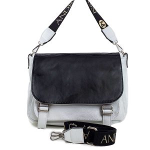 White and black women's handbag with detachable handle and patent flap