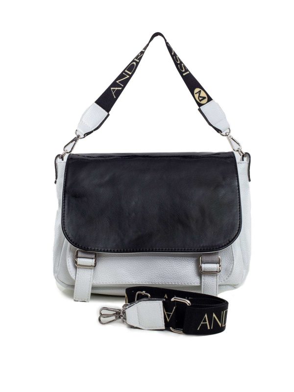 White and black women's handbag with detachable handle and patent flap