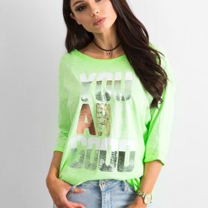 Fluo green blouse with colorful inscription