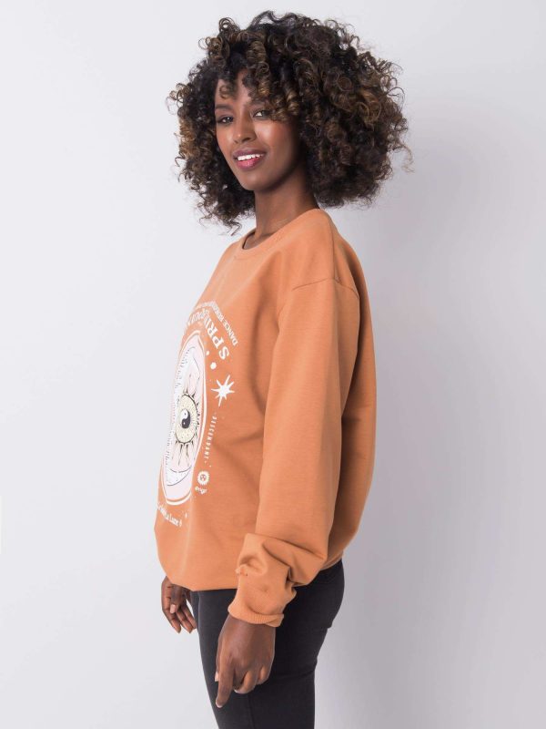 Light brown sweatshirt with print by Trisha