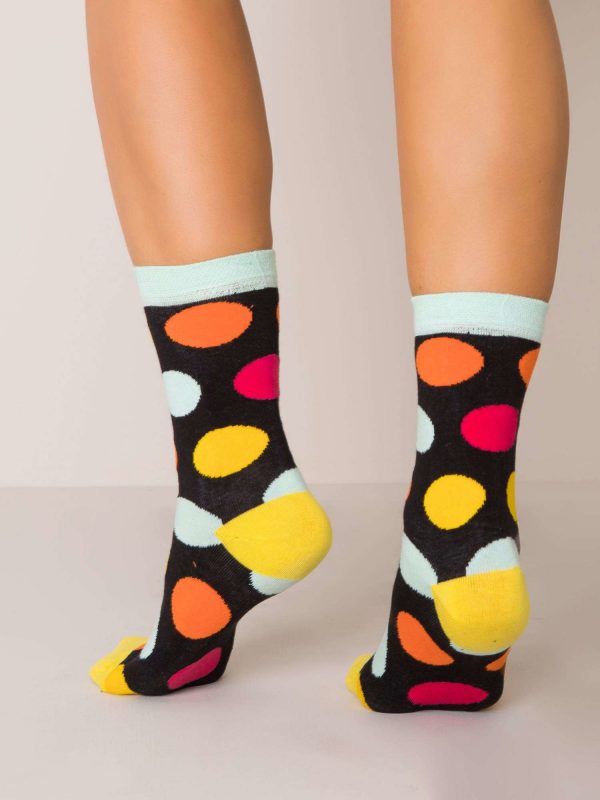 Black socks in colorful dots