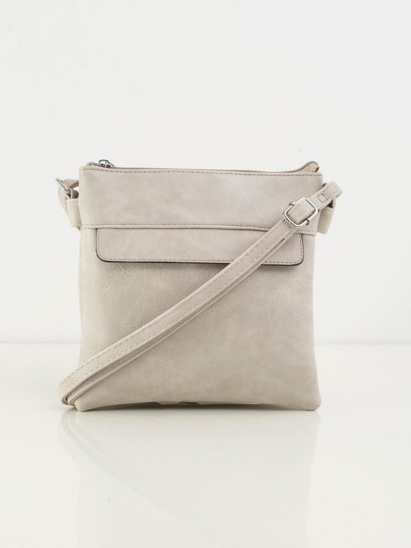 Light gray postman with long strap