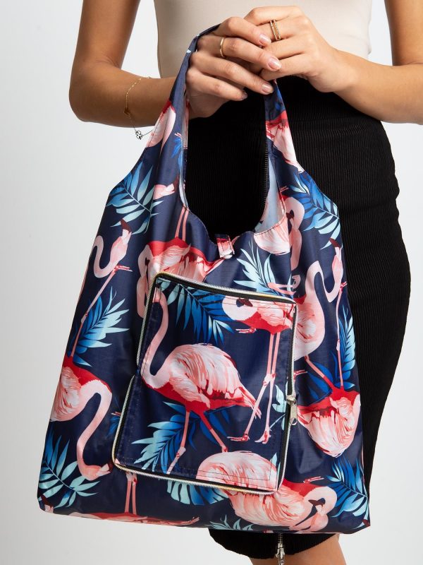 Navy blue folding bag in flamingos