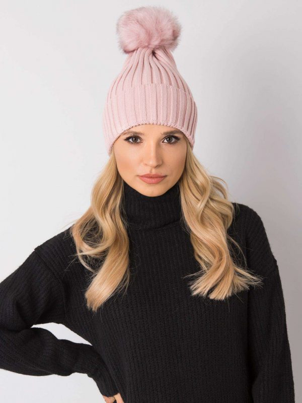 Light pink winter hat with pompom