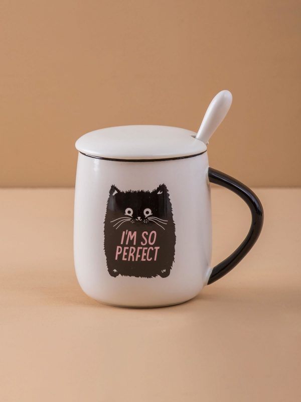 White and black mug with print