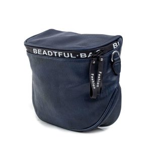 Navy blue women's handbag with detachable strap