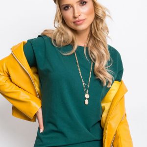 Carla's dark green blouse