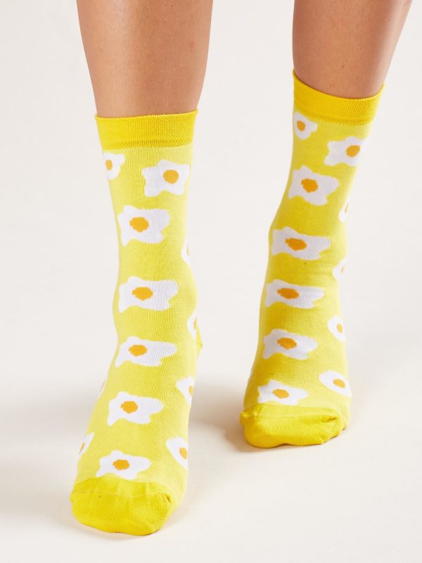 Yellow socks with egg print