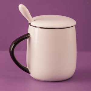 White mug with lid and cat