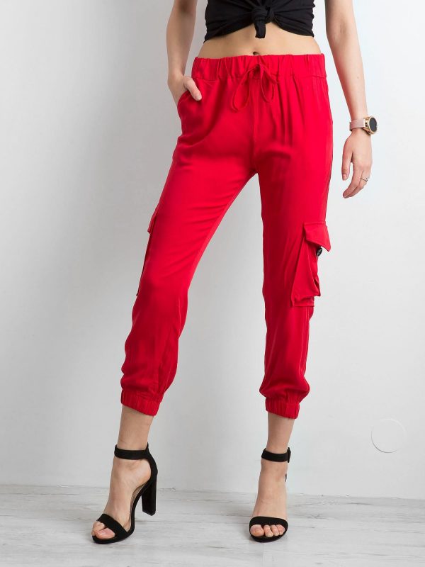 Red trousers with pockets and binding