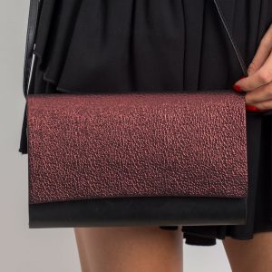 Black and burgundy clutch bag