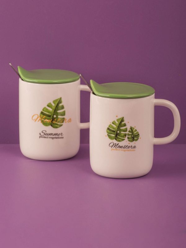 Ecru-green mug with spoon