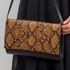 Black and brown clutch bag with snake skin motif