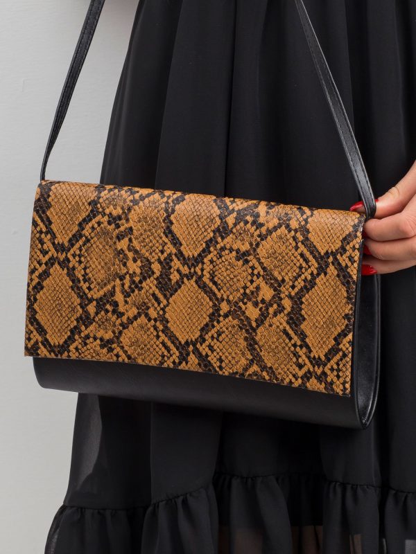 Black and brown clutch bag with snake skin motif