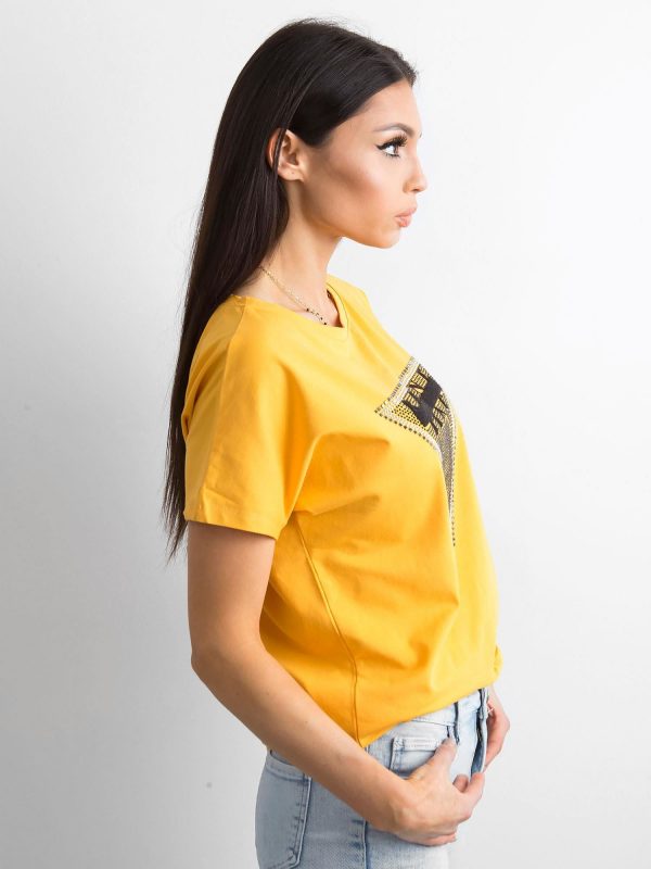 Yellow t-shirt with applique and cutout on the back