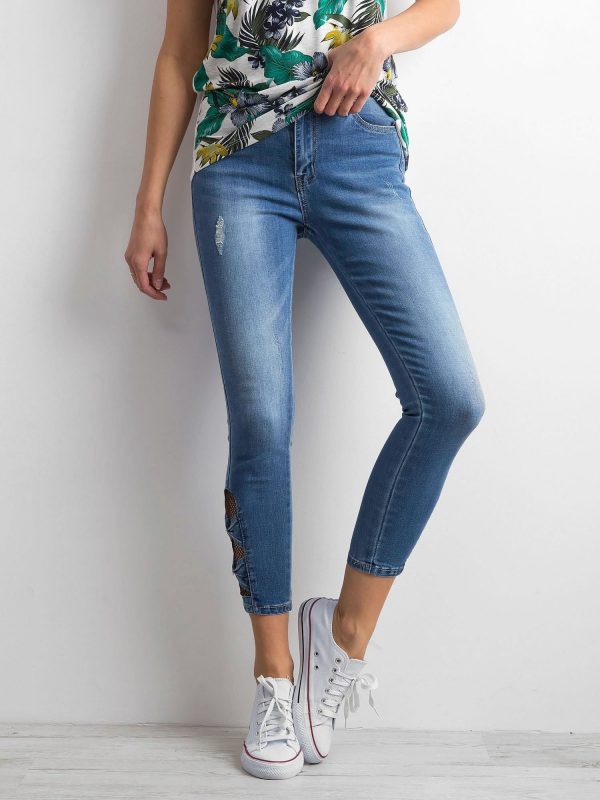 Blue skinny jeans with openwork inserts