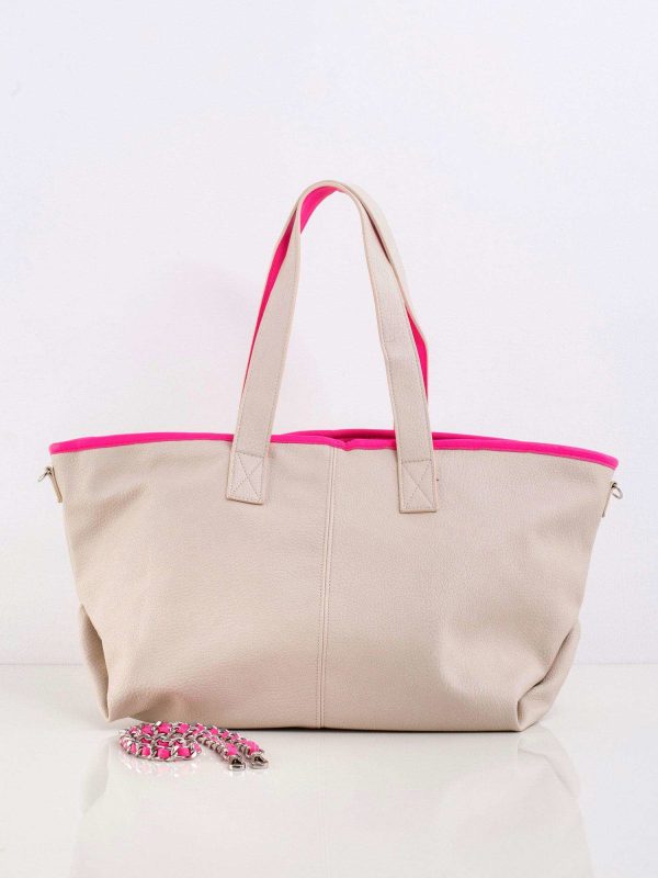 Light beige bag with decorative strap