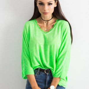 Fluo green blouse with lace at the neckline